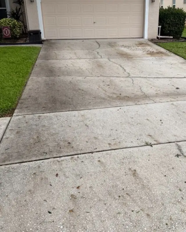 Concrete driveway in Melbourne, FL before pressure washing