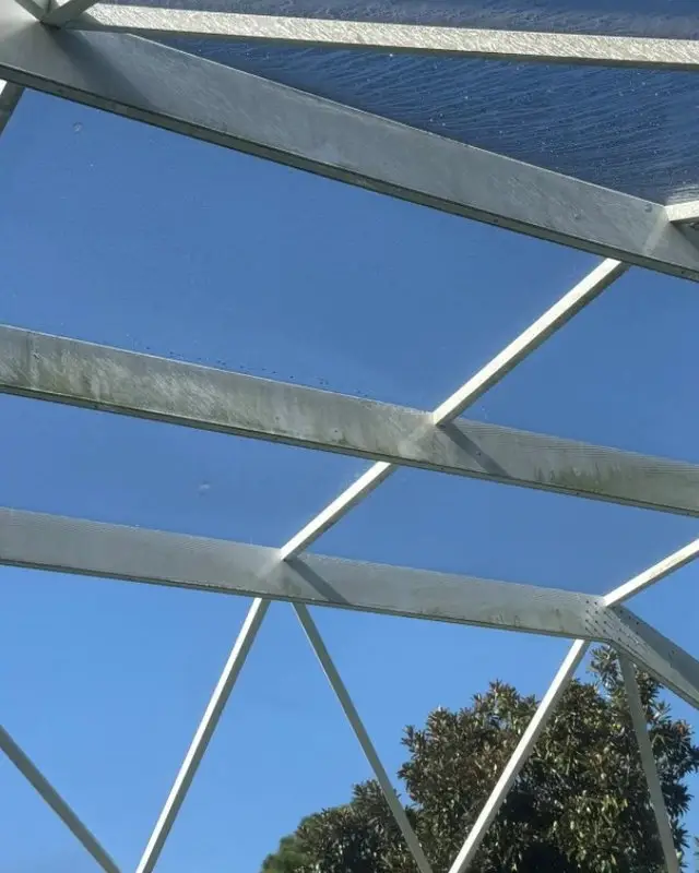 Pool screen enclosure in Melbourne, FL before cleaning